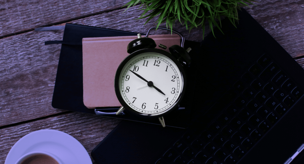 time tracking software challenges and solutions - a clock on a desk