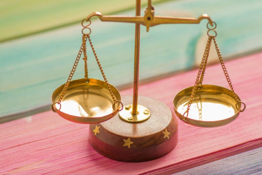 A set of balanced scales signifying the optimal employee work-life balance.