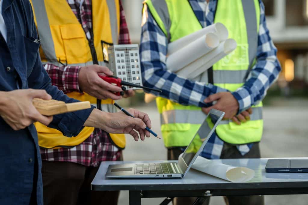 construction crew using a computer