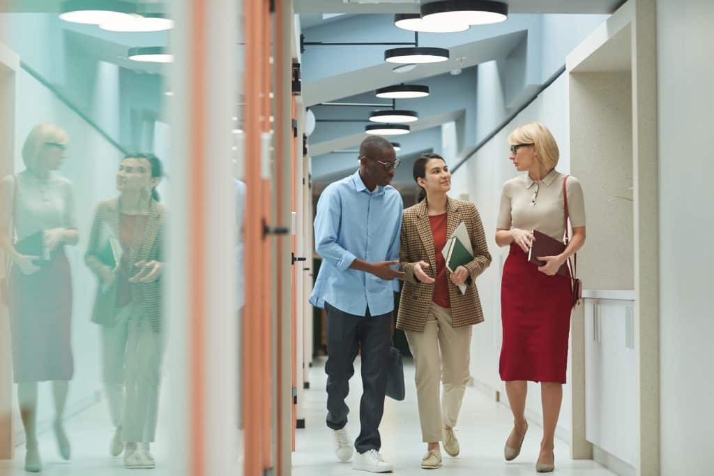 employees walking into the office. How to track employee attendance
