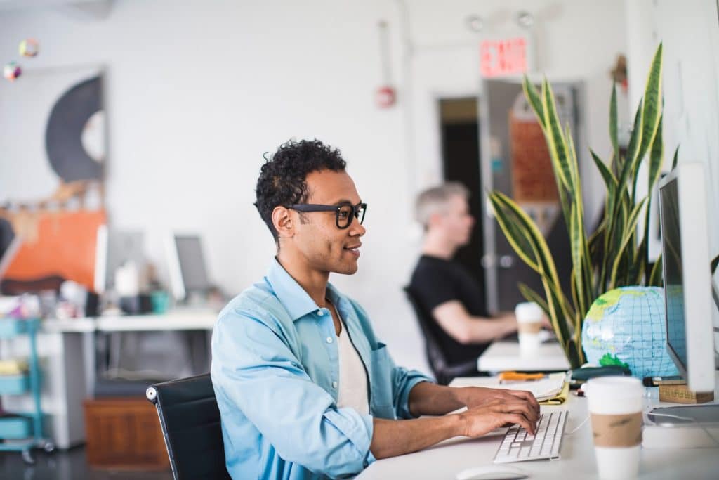 an employee working in front of a computer